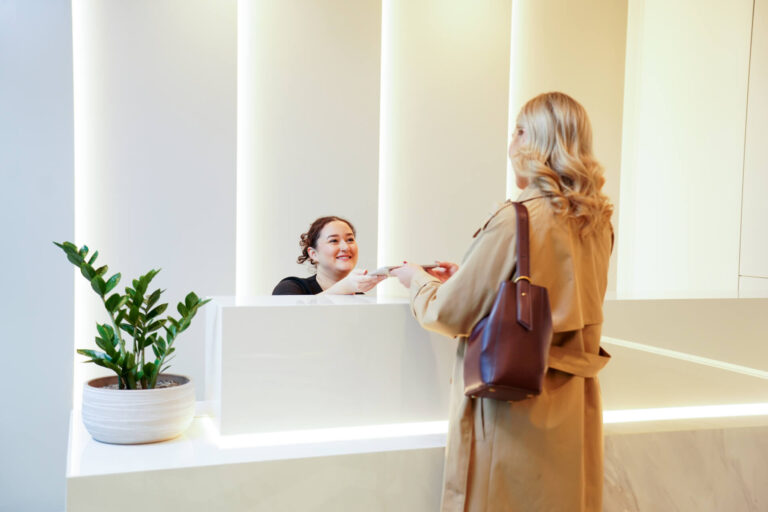 A clinician welcoming a patient at Seapoint Clinic