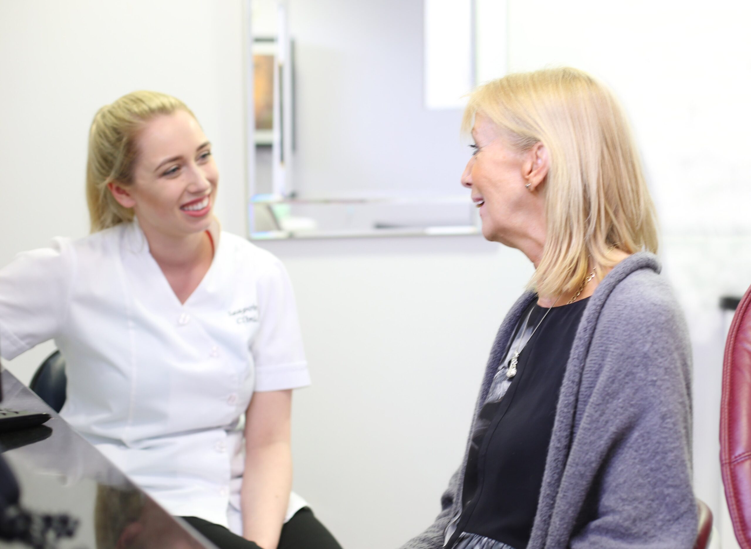 Hygienist with a senior patient at Seapoint Clinic